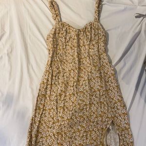 Cute Yellow Dress! It has a slight slit at the end.